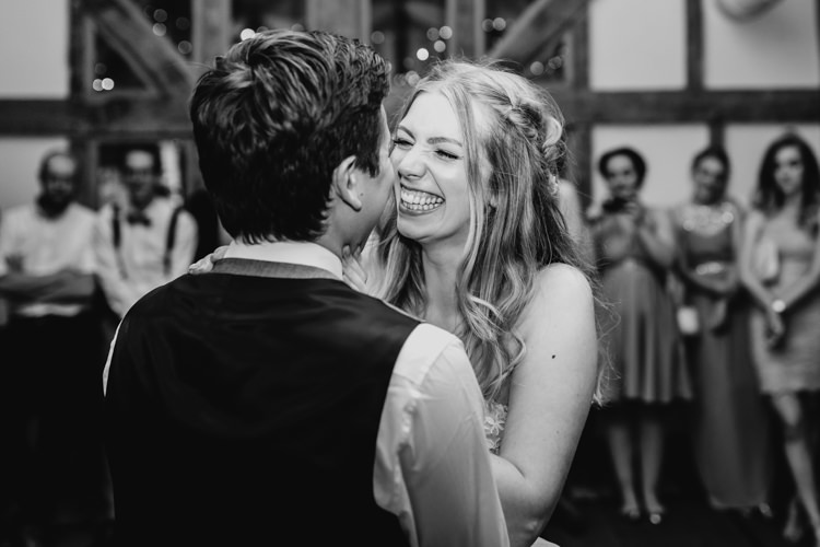 Bride Groom First Dance Laughing Black and White Informal Fun | Rustic Relaxed Cornflower Blue Barn Wedding http://www.peterhugophotography.com/