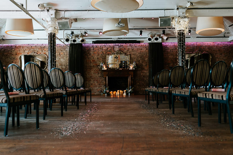 Hanging Floral Curtain Glitter Aisle Ceremony Backdrop | Glitter Dinosaurs City Wedding https://struvephotography.co.uk/