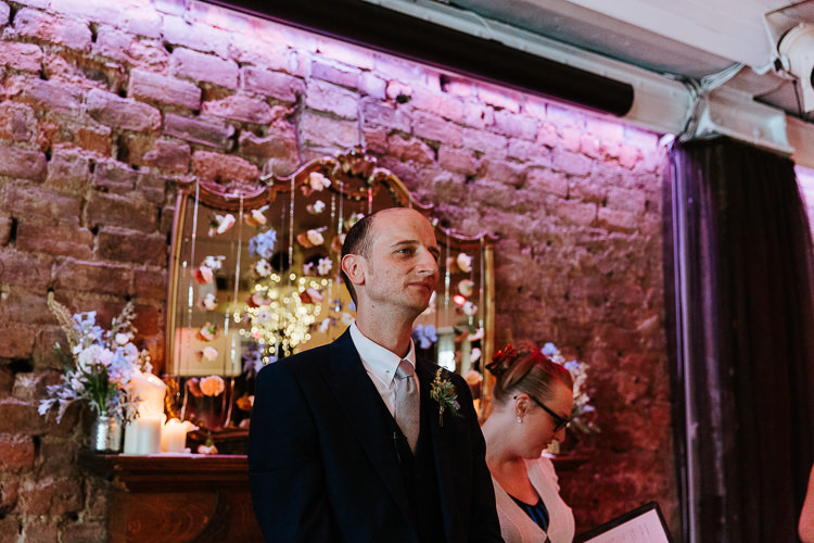 Hanging Floral Curtain Candle Ceremony Backdrop Groom Celebrant | Glitter Dinosaurs City Wedding https://struvephotography.co.uk/