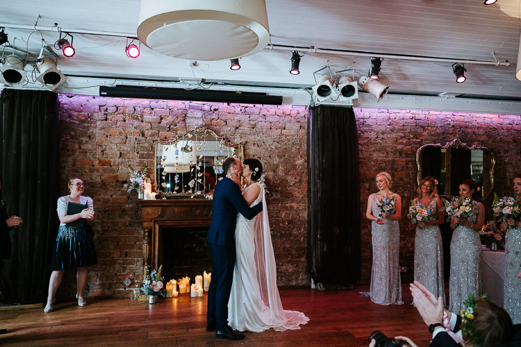 Urban Decor Ceremony Hanging Floral Curtain Bride Groom Cape Dress | Glitter Dinosaurs City Wedding https://struvephotography.co.uk/