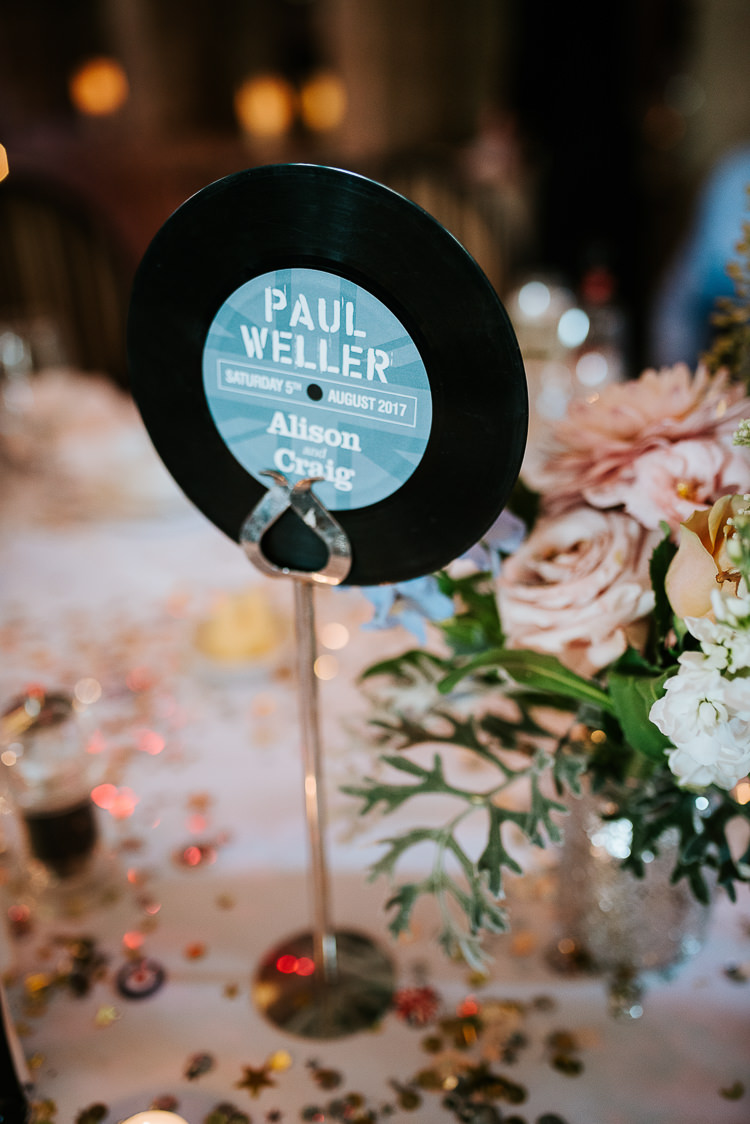Music Record Table Name Vinyl Decor Blush Pastel Flower Centrepiece | Glitter Dinosaurs City Wedding https://struvephotography.co.uk/