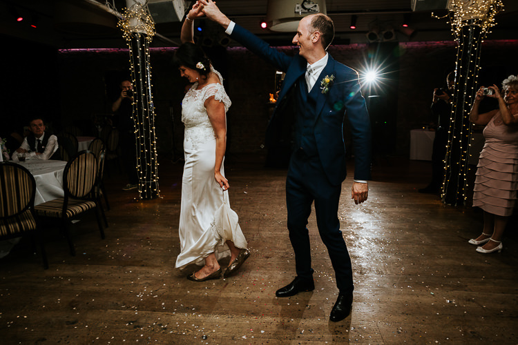 Bride Groom First Dance Urban Quirky Fun Glitter Fairy Lights | Glitter Dinosaurs City Wedding https://struvephotography.co.uk/