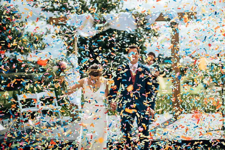 Confetti Cannon Bomb Festival Bohemian Glamping Wedding https://theshannons.photography/