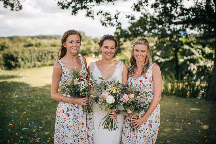 Floral Bridesmaid Dresses Liberty Print Festival Bohemian Glamping Wedding https://theshannons.photography/