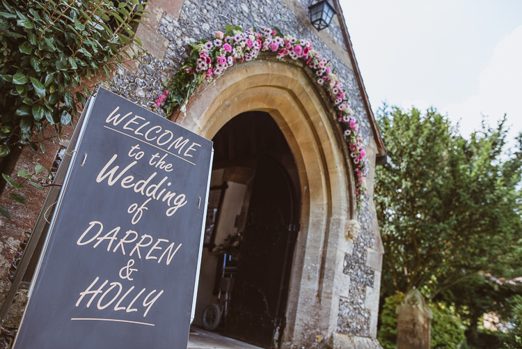 Church Welcome Sign Floral Arch Colourful Creative Vintage Railway Wedding http://joemallenphotography.co.uk/