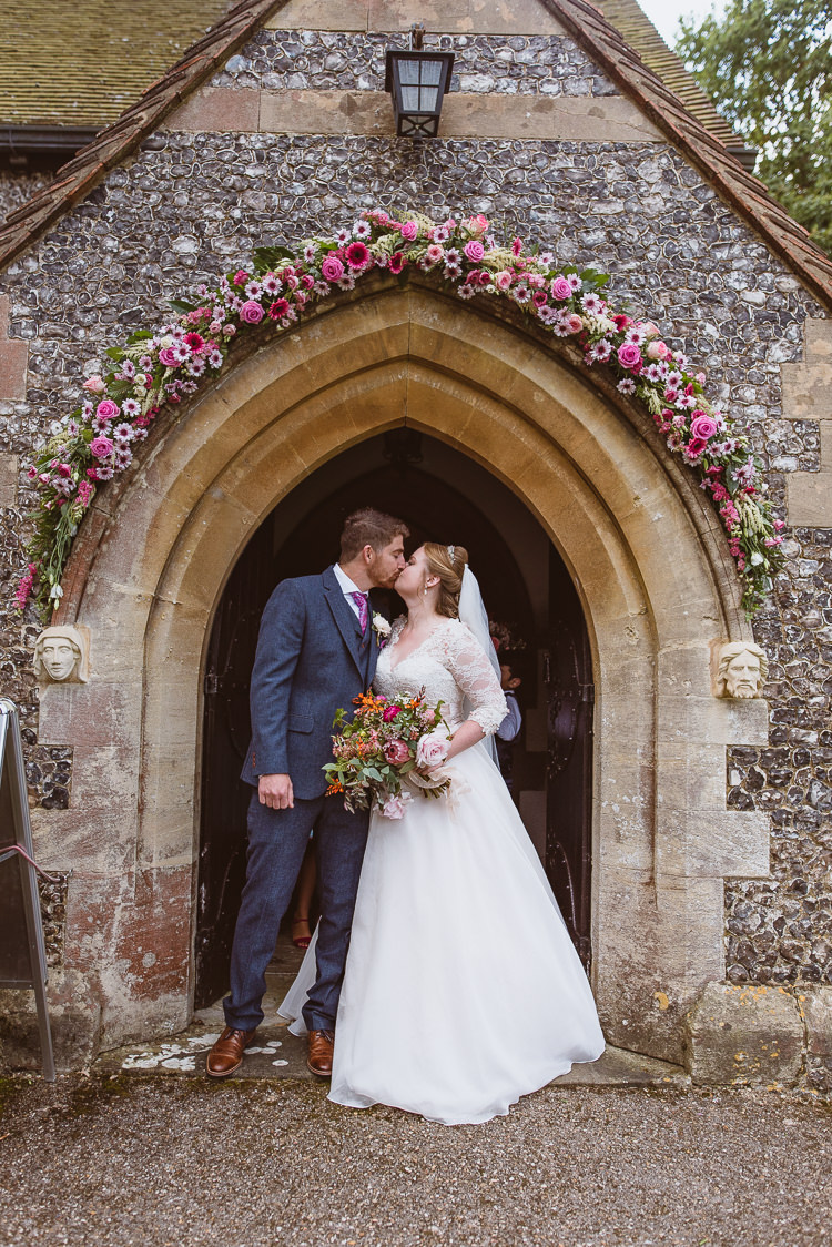 Groom Style Blue Tweed Suit Pink Tie Pocket Square Three Piece Waistcoat Bride Bridal Maggie Sottero Sleeves Sweetheart Neckline Bouquet Silk Ribbon Church Floral Arch Entrance Colourful Creative Vintage Railway Wedding http://joemallenphotography.co.uk/
