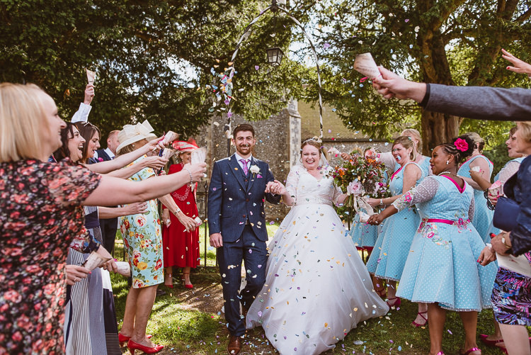 Groom Style Blue Tweed Suit Pink Tie Pocket Square Three Piece Waistcoat Bride Bridal Maggie Sottero Sleeves Sweetheart Neckline Bouquet Silk Ribbon Confetti Shot Moment Colourful Creative Vintage Railway Wedding http://joemallenphotography.co.uk/
