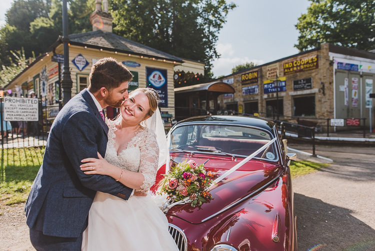 Groom Style Blue Tweed Suit Pink Tie Pocket Square Three Piece Waistcoat Bride Bridal Maggie Sottero Sleeves Sweetheart Neckline Bouquet Silk Ribbon Vintage Red Car Colourful Creative Vintage Railway Wedding http://joemallenphotography.co.uk/