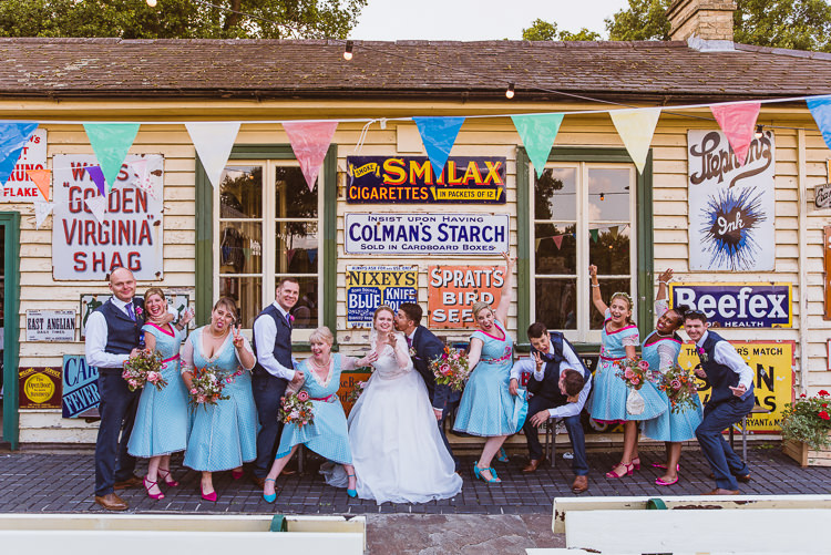 Bride Bridesmaids bridal 1950s Rockabilly Vogue Pattern Tea Length Dress Gown Maggie Sottero Sweetheart Neckline Sleeves Bouquet Vintage Signs Train Station Groom Groomsmen Navy Three Piece Suit Waistcoat Colourful Creative Vintage Railway Wedding http://joemallenphotography.co.uk/