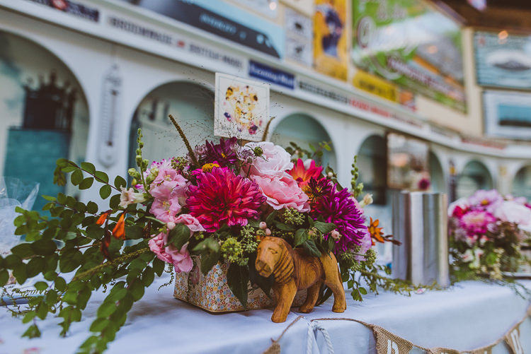 Top Table Floral Arrangement Wildlife Wooden Carving Figure Colourful Creative Vintage Railway Wedding http://joemallenphotography.co.uk/
