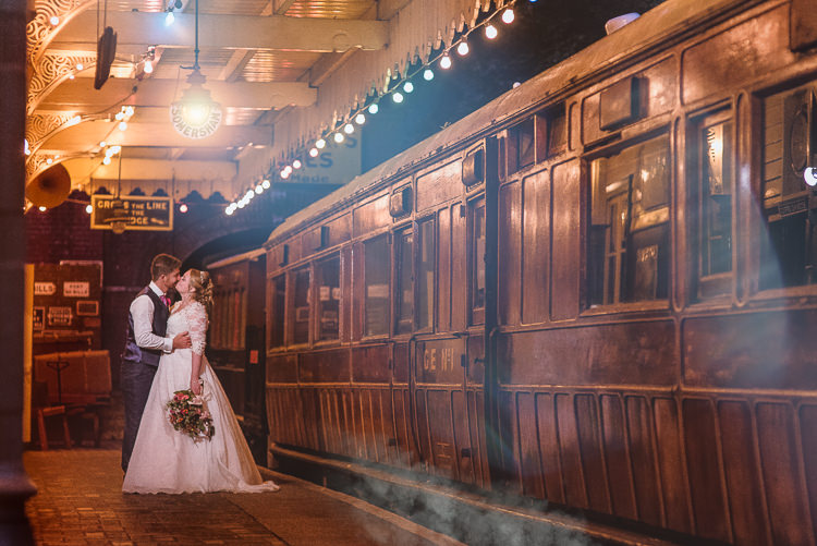 Groom Style Blue Tweed Suit Pink Tie Pocket Square Three Piece Waistcoat Bride Bridal Maggie Sottero Sleeves Sweetheart Neckline Bouquet Silk Ribbon Train Carriage Platform Colourful Creative Vintage Railway Wedding http://joemallenphotography.co.uk/