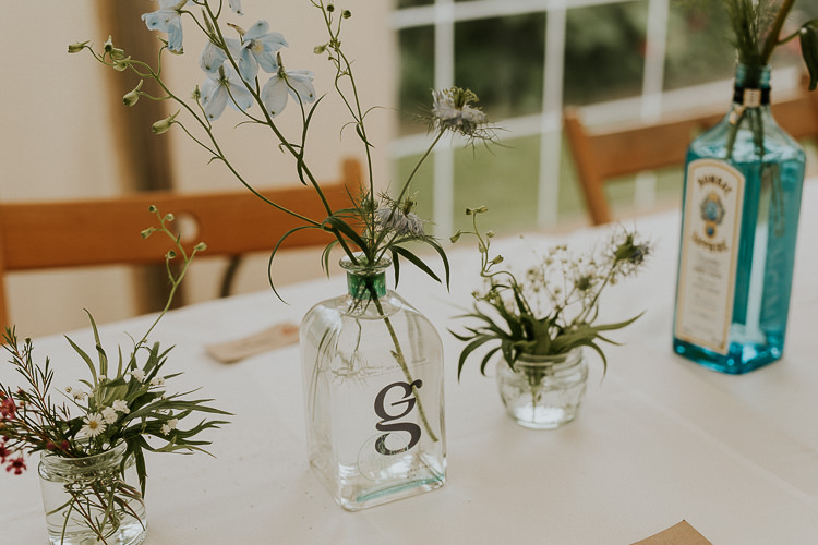 Bottle Flowers Table Decor Bright Colourful DIY Back Garden Wedding http://jonnymp.com/
