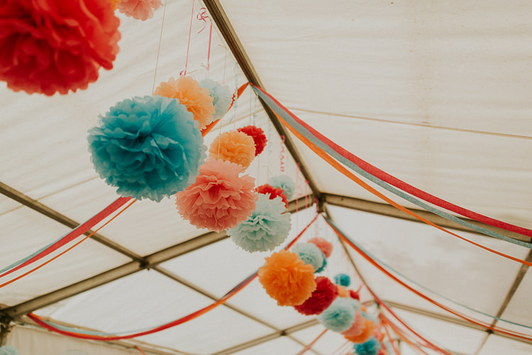 Paper Pom Poms Hanging Bright Colourful DIY Back Garden Wedding http://jonnymp.com/