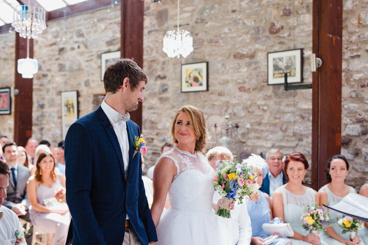 Bride Bridal Tea Length High Neck Lace Bespoke Dress Gown Wildflower Bouquet Navy Jacket Bow Tie Cream Chinos Relaxed Fun Beach DIY Wedding http://www.michellehuggleston.com/