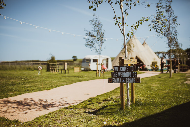 Welcome Sign Post Rustic Homemade Pallet Direction Rural Clifftop Tipi Wedding https://www.njphotographic.co.uk/