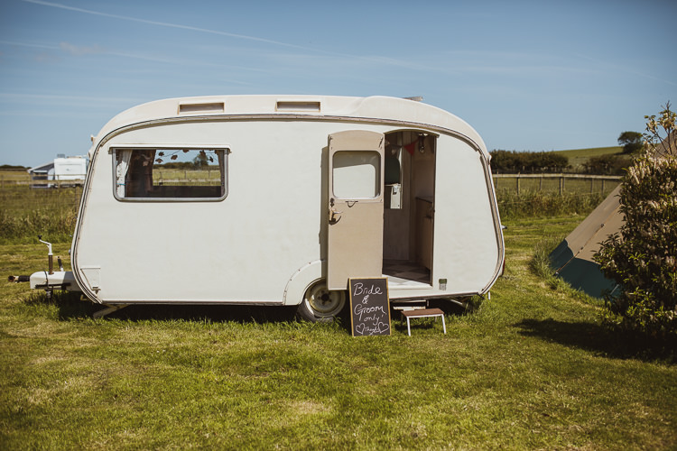 Bride & Groom Caravan Chalkboard Rural Clifftop Tipi Wedding https://www.njphotographic.co.uk/