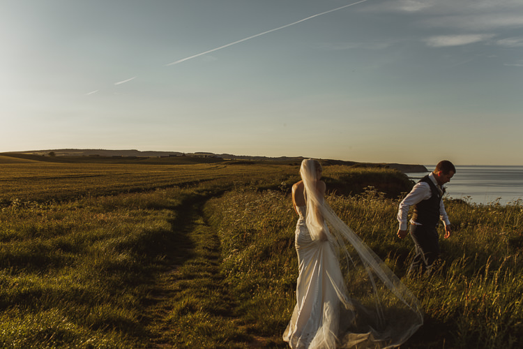 Bride Bridal Sweetheart Neckline Gown Dress Tweed Three Piece Waistcoat Groom Navy Veil Rural Clifftop Tipi Wedding https://www.njphotographic.co.uk/