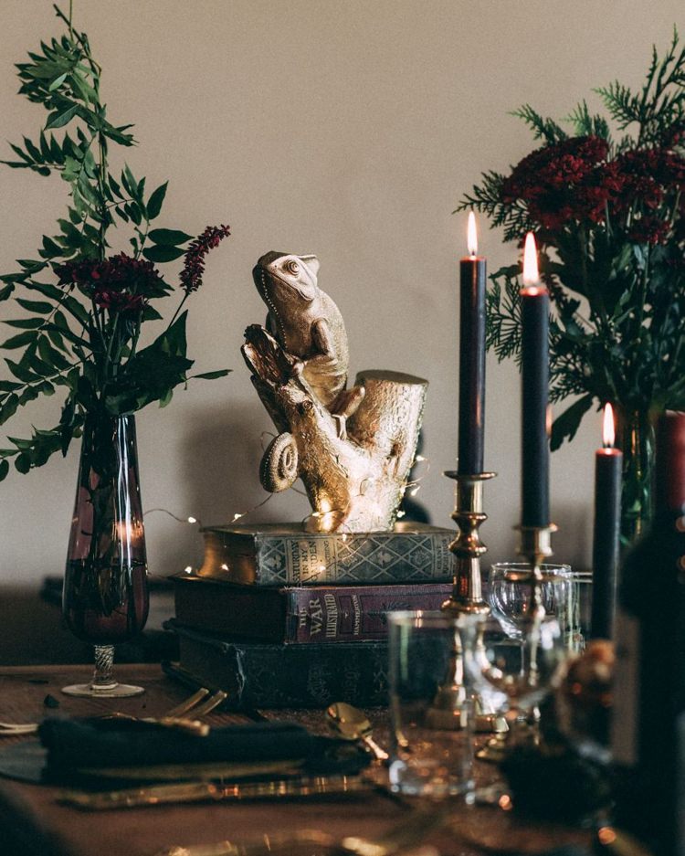 Black Candles Candlesticks Gold Animals Spray Painted Books Vintage Antique Table Setting Fairy Lights Opulent Eccentric Berry Gold Wedding https://mattaustinimages.co.uk/