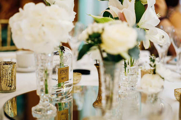 White Flowers Bottles Mirror Table Stylish Country House Rave Wedding http://www.mariannechua.com/
