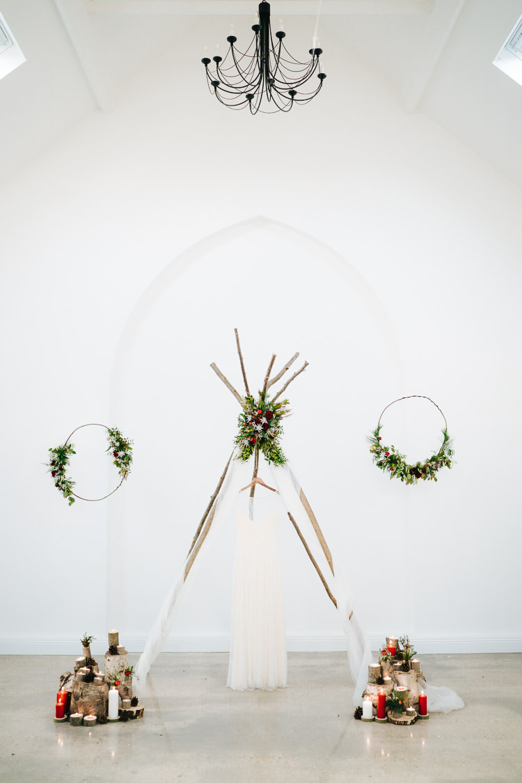 Naked Tipi Backdrop Red Green Winter Wonderland Wedding Ideas http://www.angelawardbrown.com/