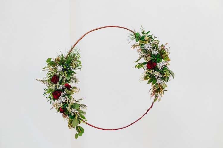 Flowers Greenery Folliage Rose Hoop Wreath Red Green Winter Wonderland Wedding Ideas http://www.angelawardbrown.com/