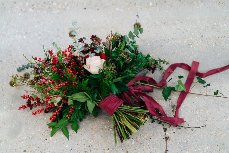 Flowers Greenery Folliage Rose Bouquet Ribbon Bride Bridal Red Green Winter Wonderland Wedding Ideas http://www.angelawardbrown.com/