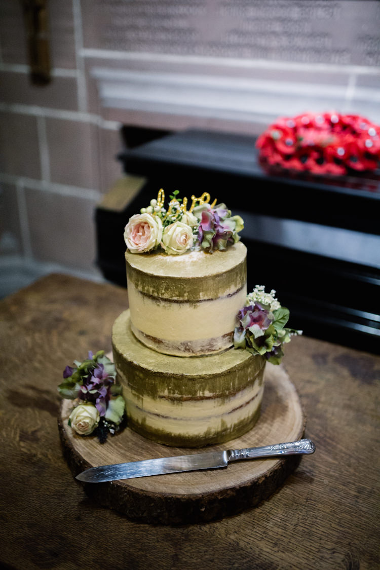 Gold Buttercream Cake Tiered Flowers Floral Laser Cut Topper Wood Slice Playful Metallic Zoo Winter Wedding https://www.jennbrookesphotographer.com/