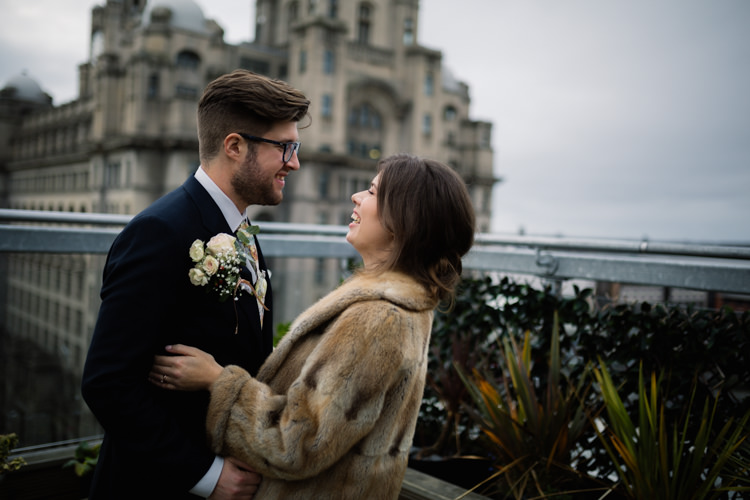 Bride Bridal Gown Dress Silk Bias V Neck Lace Insert Groom Pocket Square Navy Suit Fur Coat Playful Metallic Zoo Winter Wedding https://www.jennbrookesphotographer.com/