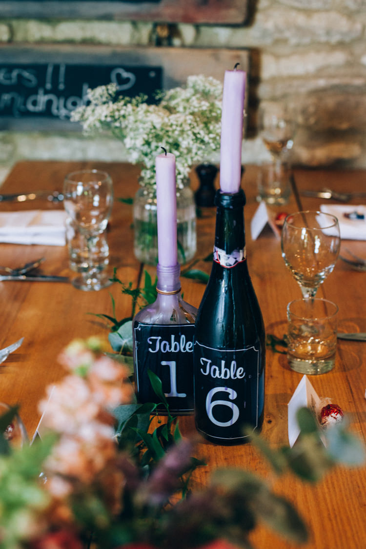 Bottle Candles Table Numbers Flowery Bohemian Secret Garden Wedding https://caseyavenue.co.uk/
