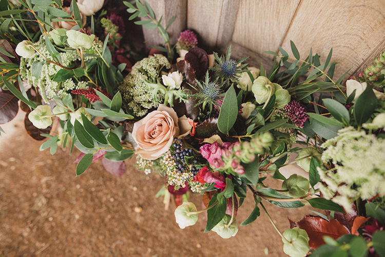 Bouquets Flowers Red Peach Foliage Joyful Warm Cosy Autumn Barn Wedding http://www.rebeccadouglas.co.uk/