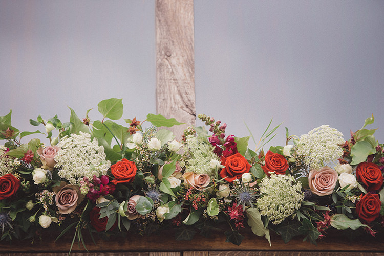 Flower Garland Swag Red Rose Joyful Warm Cosy Autumn Barn Wedding http://www.rebeccadouglas.co.uk/