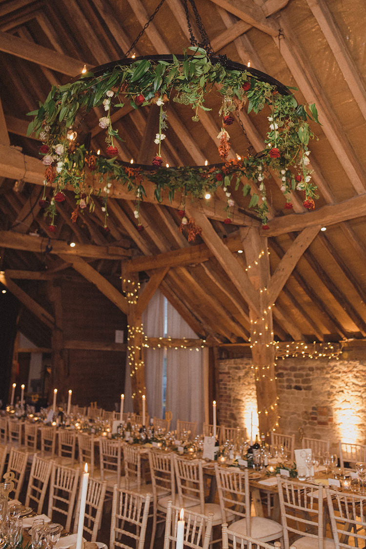 Hoop Chandelier Hanging Flowers Greenery Joyful Warm Cosy Autumn Barn Wedding http://www.rebeccadouglas.co.uk/