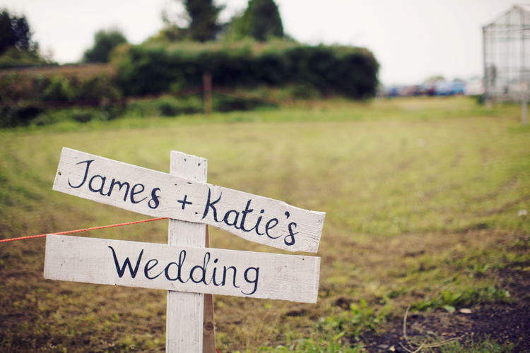 Painted Wooden Sign Post Relaxed Lavender Farm Marquee Wedding https://sashaleephotography.com/