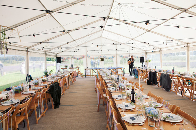 Festoon Lights Relaxed Lavender Farm Marquee Wedding https://sashaleephotography.com/