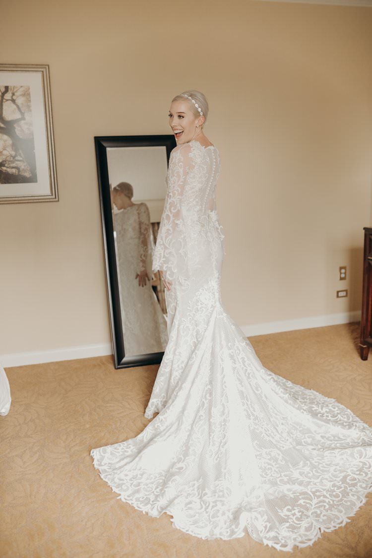 Modern Stylish Chic Bridalwear Train Wedding Dress Long Bell Sleeves Intricate Illusion Lace Short Hair | Urban Industrial Luxe Wedding http://hellencophotos.com/