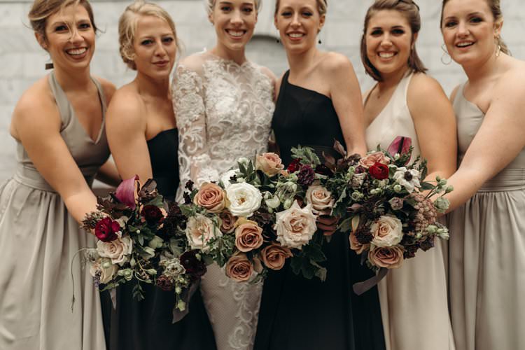 Bride Bridesmaids Grey Black Beige Mauve Group Photo City Building Outdoors | Urban Industrial Luxe Wedding http://hellencophotos.com/