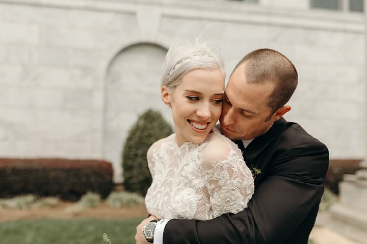 Modern Stylish Chic Bridalwear Wedding Dress Long Bell Sleeves Intricate Illusion Lace Short Hair Groom Kiss | Urban Industrial Luxe Wedding http://hellencophotos.com/