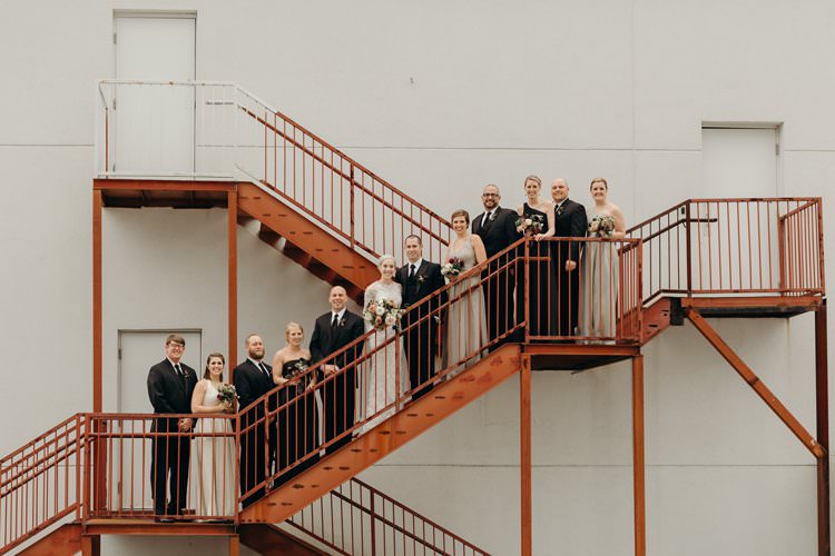 Modern City Bride Groom Bridemaids Groomsmen Staircase The Foundry Puritan Mill | Urban Industrial Luxe Wedding http://hellencophotos.com/