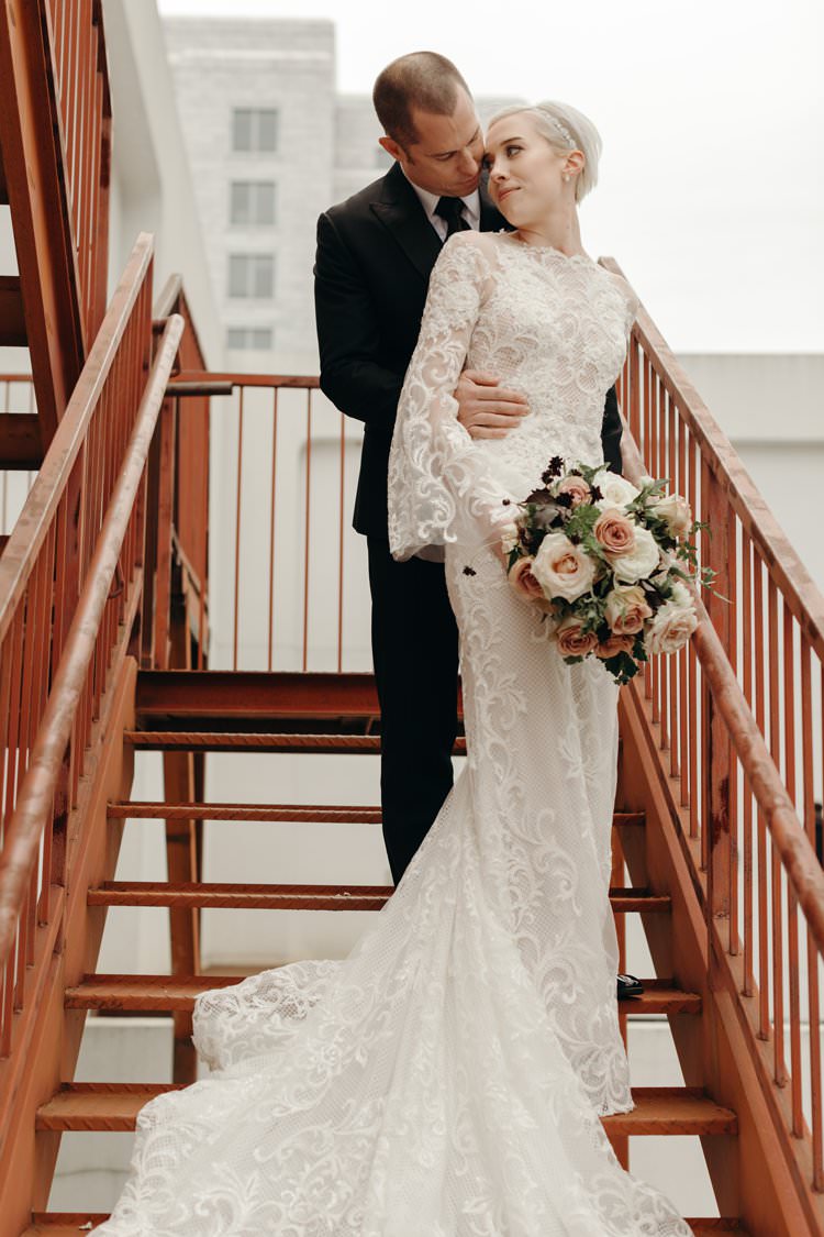 Modern City Bride Groom Staircase The Foundry Puritan Mill | Urban Industrial Luxe Wedding http://hellencophotos.com/
