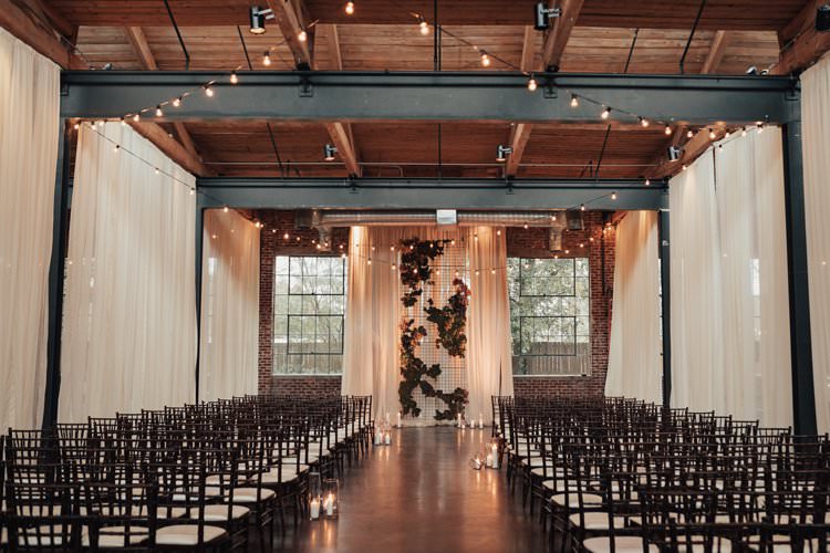 Modern Stylish Chic Geometric Ceremony Aisle Installation Backdrop Moss Candles Warehouse | Urban Industrial Luxe Wedding http://hellencophotos.com/