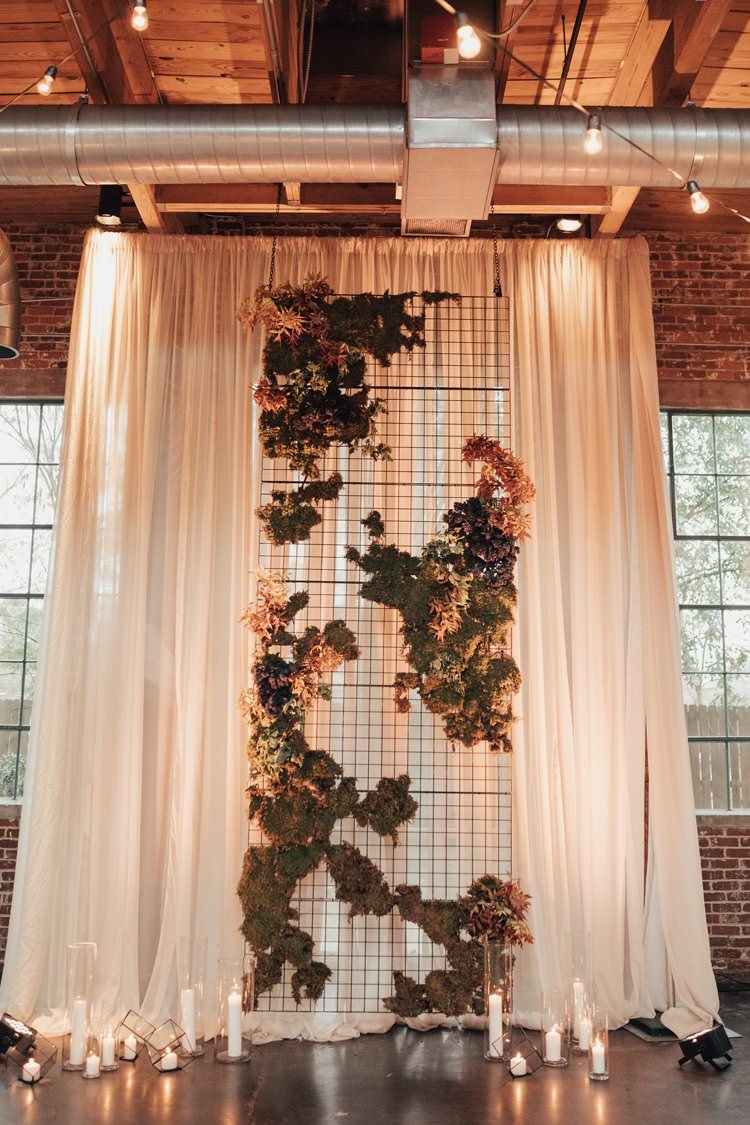 Modern Stylish Chic Geometric Ceremony Aisle Installation Backdrop Moss Candles Warehouse | Urban Industrial Luxe Wedding http://hellencophotos.com/
