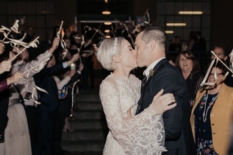 Bride Groom End of Night Kiss Ribbon Exit | Urban Industrial Luxe Wedding http://hellencophotos.com/
