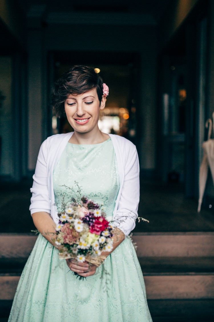 Bridesmaid Lindy Bop Mint Green 50s Tea Length Dress White Cardigan Retro Posy Bouquet Old Fashioned Fete Cricket Pavilion Wedding https://www.naomijanephotography.com/