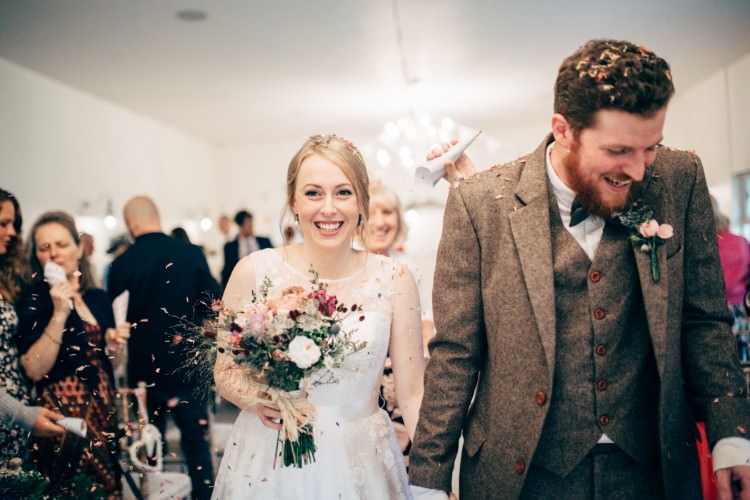 Bride Bridal Dress Gown Tea Length Sweetheart Neckline Lace Tweed Three Piece Waistcoat Suit Bow Tie Confetti Old Fashioned Fete Cricket Pavilion Wedding https://www.naomijanephotography.com/