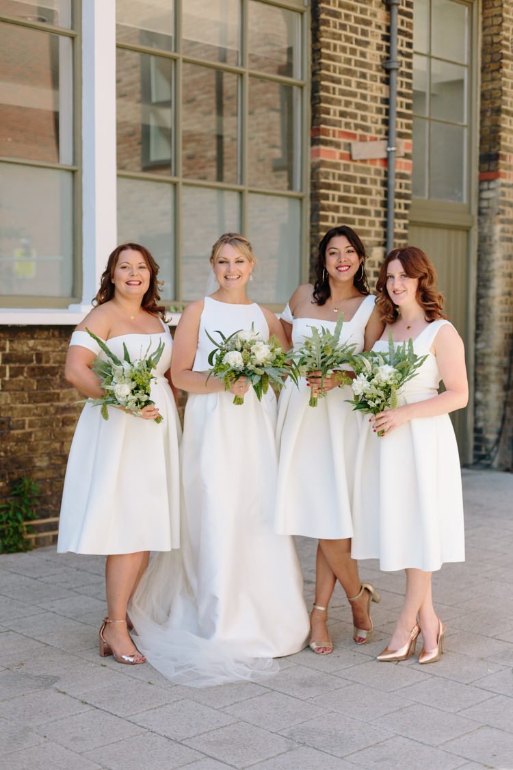 Bride Jesus Peiro Dress White Bridesmaids ASOS Simple Foliage Greenery Gold Bouquet | Modern Tropical Gold Urban Wedding https://www.christinewehrmeier.com/