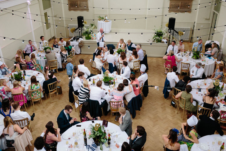 London Shoreditch The Tab Centre Wedding White Gold Green Tropical Festoon Lights Paper Pompoms | Modern Tropical Gold Urban Wedding https://www.christinewehrmeier.com/