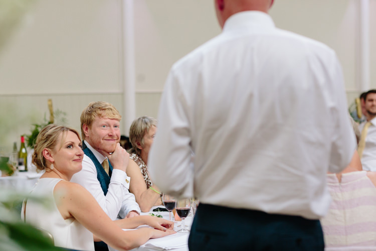 Bride Groom Speeches Smiling Happy Wedding Guest | Modern Tropical Gold Urban Wedding https://www.christinewehrmeier.com/