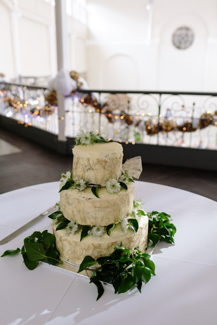 Chocolate Fudge Homemade Cake White Green Tropical Fresh Flowers Leaves | Modern Tropical Gold Urban Wedding https://www.christinewehrmeier.com/