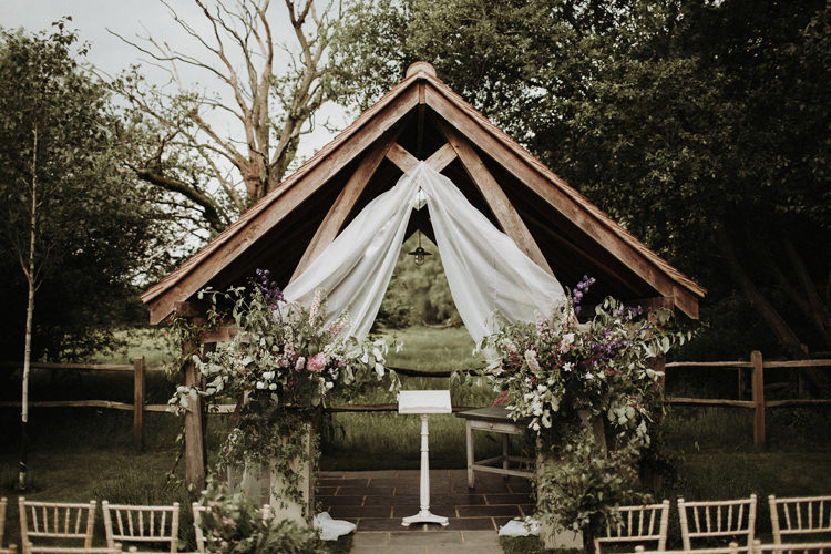 Frame Arch Flowers Backdrop Ceremony Silvery Grey Nature Wedding https://jonathanellisblog.com/