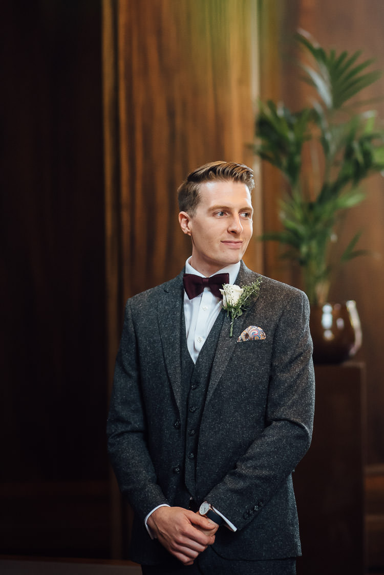 Groom Grey Tweed Suit Burgundy Bow Tie Three Piece Waistcoat Pocket Square Chic Relaxed London Pub Wedding https://theshannons.photography/